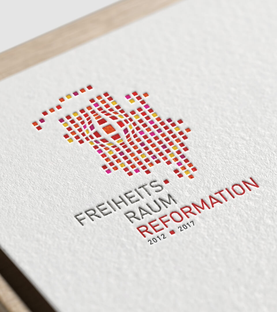 Kundenreferenz Freiheitsraum Reformation - Logo-Design mit Blindprägung